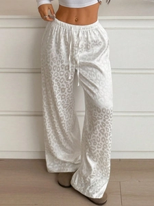 Women's leopard print wide-leg pants in light grey with satin finish and elastic waist