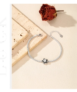 Detailed view of S925 sterling silver star pendant tennis bracelet with lobster clasp