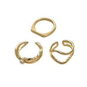 Three-piece minimalist gold geometric ring set with pearl detail for women in 1688 style
