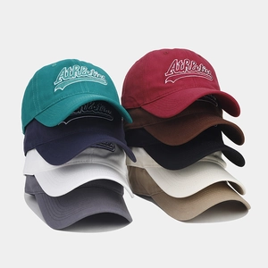 Detailed embroidery of Athletics text on multi-colored cotton canvas baseball caps