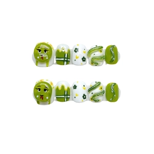Handmade press-on nails with 3D zodiac snake design in vibrant green and white gloss