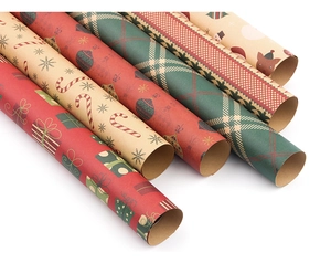Detail view of various Christmas kraft wrapping paper rolls with festive holiday patterns