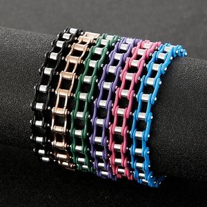 Men's stainless steel bicycle chain bracelets in six vibrant metallic colors on display