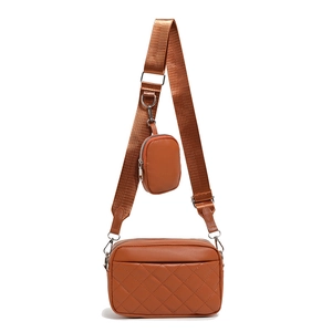 Brown quilted leather crossbody bag set with wide strap and detachable coin purse