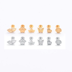 G23 titanium labret studs set in gold and silver featuring heart, butterfly, and leaf shapes