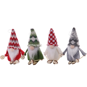 Set of 4 Christmas skiing gnomes with knitted hats and wooden skis for festive decor