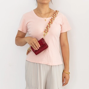 Red crocodile pattern mini bag with decorative chunky resin and gold chain strap