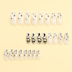 Starry snake pattern press-on nails with rhinestones on cream background 24pcs set