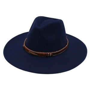 Detailed view of dark blue felt fedora featuring a braided band and golden feather charm