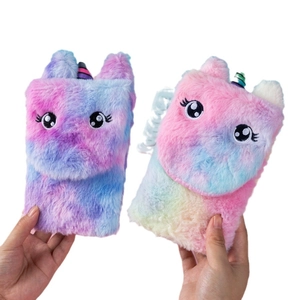 Cute unicorn plush diary notebooks with colorful horns and embroidery in vibrant gradients