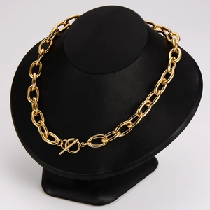 Golden 12mm chunky O-chain necklace with classic toggle OT clasp on a display stand