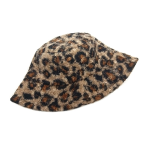 Close-up of leopard print faux fur texture on a plush bucket hat for winter