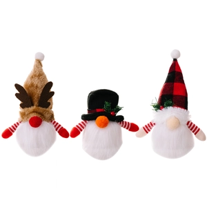 Three Christmas gnomes with glowing noses and reindeer antlers on a white background