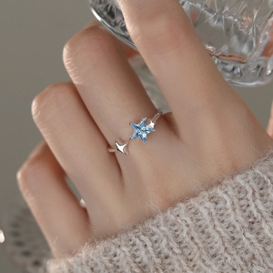 S925 sterling silver ring with sea blue star-shaped zircon and adjustable open band