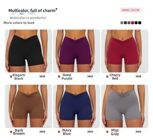 Detail view of high waisted yoga shorts in six vibrant colors with V-cross waistband