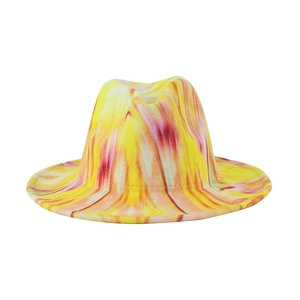 Macro detail of the yellow tie-dye marble texture on this stylish wool fedora hat