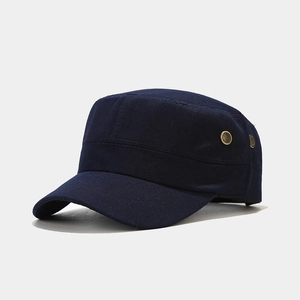 Detail of navy blue cadet cap with copper eyelets and durable twill fabric texture