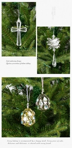 Detail of luxury acrylic cross and egg-shaped Christmas ornaments with colorful jewels