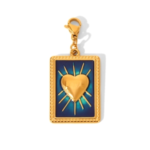 Detail of gold heart pendant with LOVE engraving and blue enamel evil eye motif