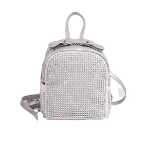 Silver rhinestone mini backpack for women with metallic finish and adjustable straps