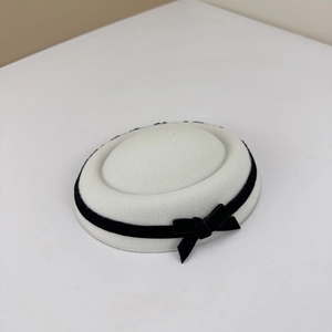 French vintage white pillbox hat with black velvet ribbon bow and round felt dome design