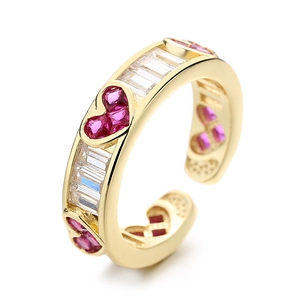 Adjustable golden ring with pink heart stones and rectangular zircons in a 45-degree view