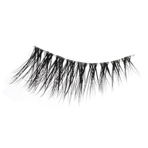 Detailed view of layered thick black false eyelashes with a transparent lash band