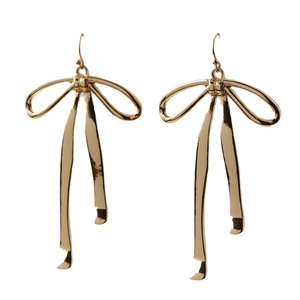 Elegant gold ribbon bow drop earrings with high-polish finish for women on white background