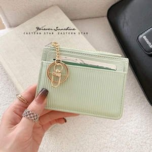 Mint green textured PU leather card holder with gold zipper and keychain for women
