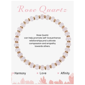 Handmade Rose Quartz beaded bracelet with gold accents on a decorative gift card