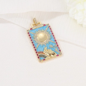 Golden sun and hand tarot pendant with blue enamel and colorful zircon accents