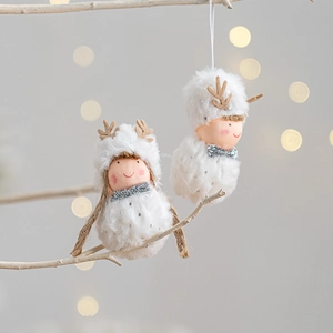 Plush Christmas snowman dolls with faux fur and wooden antlers on white winter branches