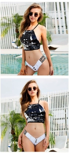 Detail von weißen Denim-Hotpants mit LOVE-Bund und schwarzem Neckholder-Top mit Pailletten