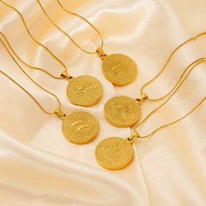 Retro 18K gold plated zodiac coin pendant necklace set on an elegant beige silk background