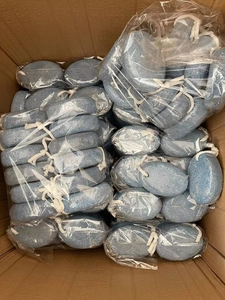 Bulk blue oval pumice stones with white ropes individually packed in a shipping box