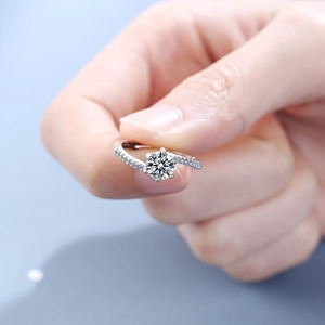 Elegant silver wide band ring featuring a six-prong round zircon center and pavé side stones