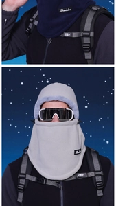 Detail of fleece windproof ski mask with faux fur lining and adjustable drawstring