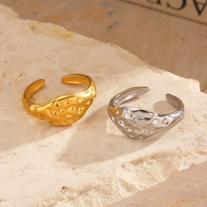 Hammered 18K gold and silver plated stainless steel open rings with lava texture