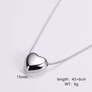 Detail view of polished silver 3D heart pendant with sleek snake chain measurements
