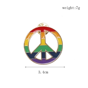 Detailed macro view showing a vibrant rainbow peace symbol enamel pin badge, 3.4cm size