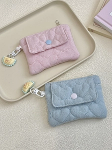 Quilted heart pattern mini pouch with zipper and bear pendant in pink and blue colors