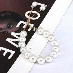 Elegant adjustable freshwater pearl bracelet with golden snake chain and sliding clasp