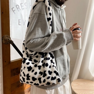 Chic cow print faux fur tote bag with large capacity for winter casual shoulder wear