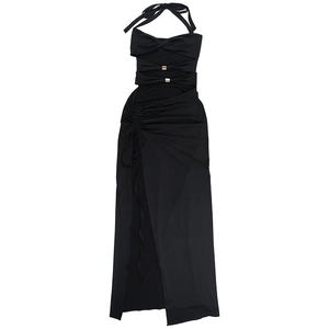 Detail of black halter maxi dress showing hollow-out bust with a golden metal buckle