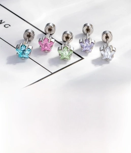 Detail of five-color star zircon stud earrings with silver titanium steel flat backs