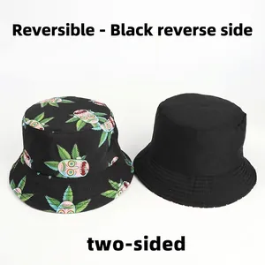Reversible bucket hat with cartoon character prints and solid black side for outdoors