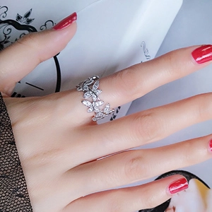 Exquisite silver butterfly wrap ring with pavé cubic zirconia on model hand