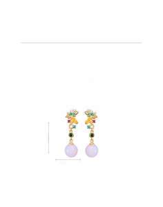 Macro detail of Chinese lotus earrings with purple beads and zircon measuring 3.8cm