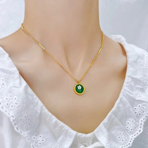 French vintage daisy flower pendant necklace in gold titanium steel on model neck