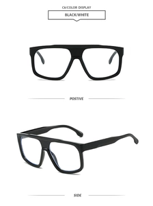 Front and side 45-degree angle views of oversized black frame futuristic sunglasses